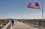 Flag whipping in a stiff breeze.